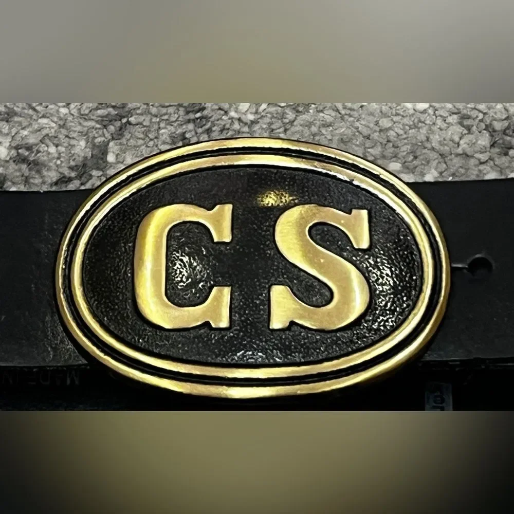Confederate Civil War-style belt buckle on a Levis’s black leather belt L 38-40